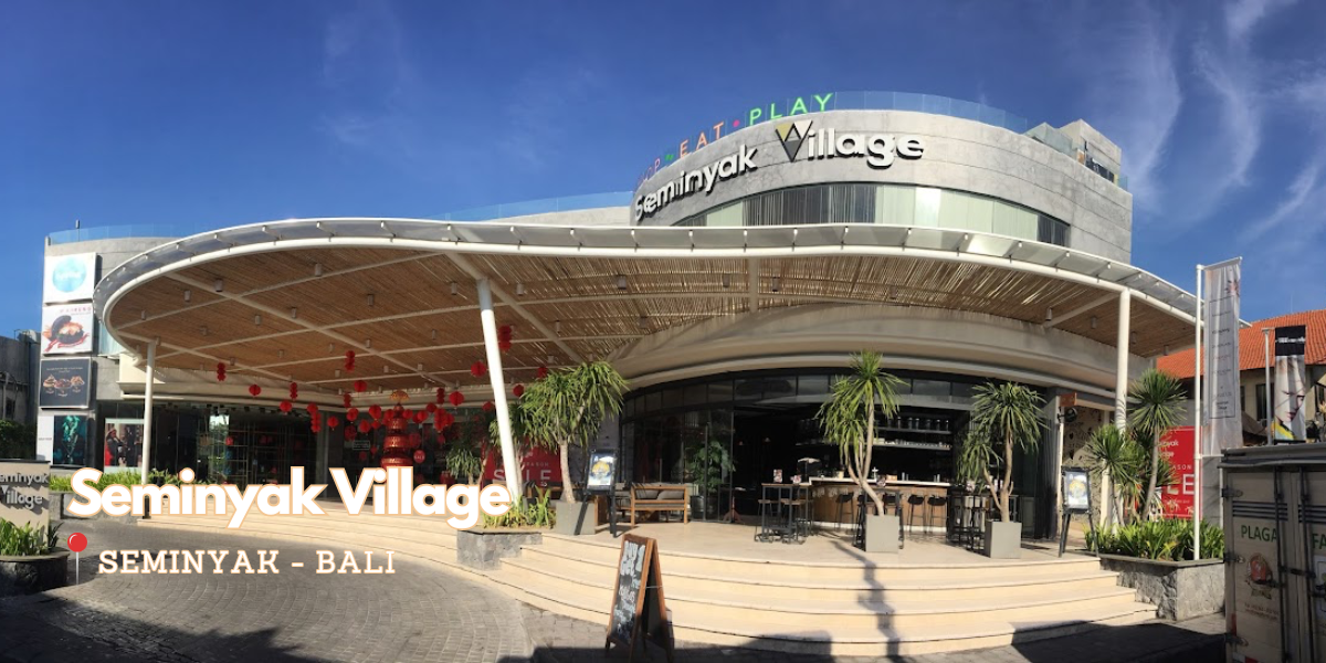 # Seminyak Village: Your Gateway to Bali’s Stylish Shopping Scene
Seminyak Village is a premier shopping destination in Bali, offering a curated selection of fashion, lifestyle, and dining experiences. Located in the heart of Seminyak, this open-air mall provides a sophisticated and relaxed atmosphere for visitors.
## What to Expect
* **Fashion Boutiques:** Discover a range of designer boutiques and independent labels, showcasing the latest trends in clothing, accessories, and footwear.
* **Lifestyle Stores:** Explore stores offering home décor, art, and unique souvenirs to bring a piece of Bali back home.
* **Dining Options:** Enjoy a variety of culinary delights, from casual cafes to upscale restaurants, serving both local and international cuisine.
* **Events and Activities:** Seminyak Village often hosts events, exhibitions, and promotions, adding to the vibrant atmosphere.
## Highlights
* **Strategic Location:** Situated in the heart of Seminyak, it's easily accessible from major hotels and villas.
* **Architectural Design:** The mall's design blends seamlessly with the tropical surroundings, creating a pleasant shopping environment.
* **Diverse Offerings:** Catering to a wide range of tastes and budgets, Seminyak Village has something for everyone.
## Tips for Visitors
* **Best Time to Visit:** The mall is open daily, but the best time to visit is during the cooler hours of the day.
* **Transportation:** Taxis and ride-sharing services are readily available.
* **Nearby Attractions:** Combine your shopping trip with a visit to Seminyak Beach or explore the surrounding areas.